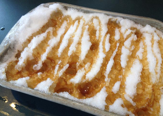 Delicious Maple Taffy on Snow. An old-fashioned French tradition. Boil the syrup, sugar, butter and vanilla. The taffy caramelizes and hardens on the snow.