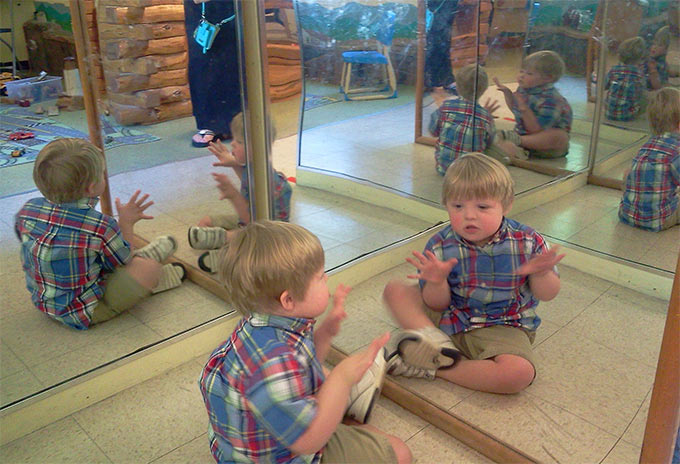 They didn't know that Hudson would be mesmerized by his own reflection. That his best friend would be that other little person he sees in the mirror.
