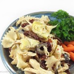 Chicken Artichoke Pasta Salad with Sun Dried Tomatoes: a bold tasting main dish pasta salad. Perfect for spring and summer, picnics and outdoor concerts.