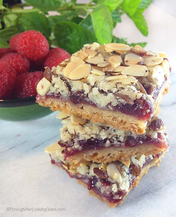 These bars are simple to make and use all the goodies: butter, flour, sugar, jam, almonds. You are gonna love these Raspberry Peach Shortbread bars.