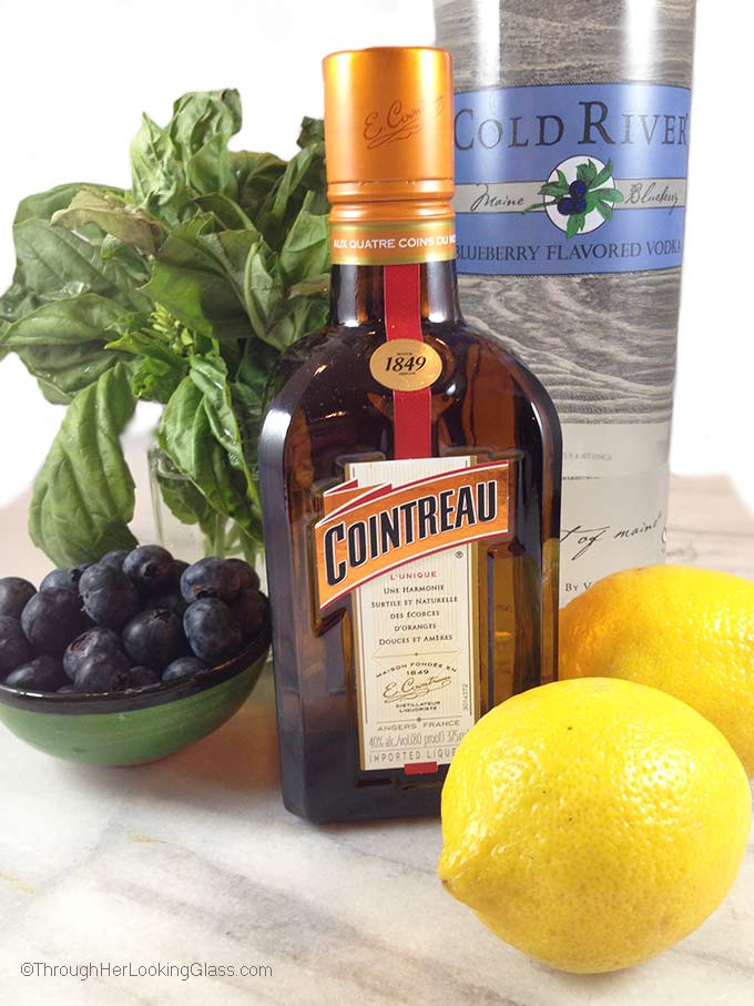 Blueberry Basil Mojito: A refreshing cocktail perfect for patio or poolside. Cointreau, Cold River Blueberry vodka and lemons mingle for the perfect mojito.