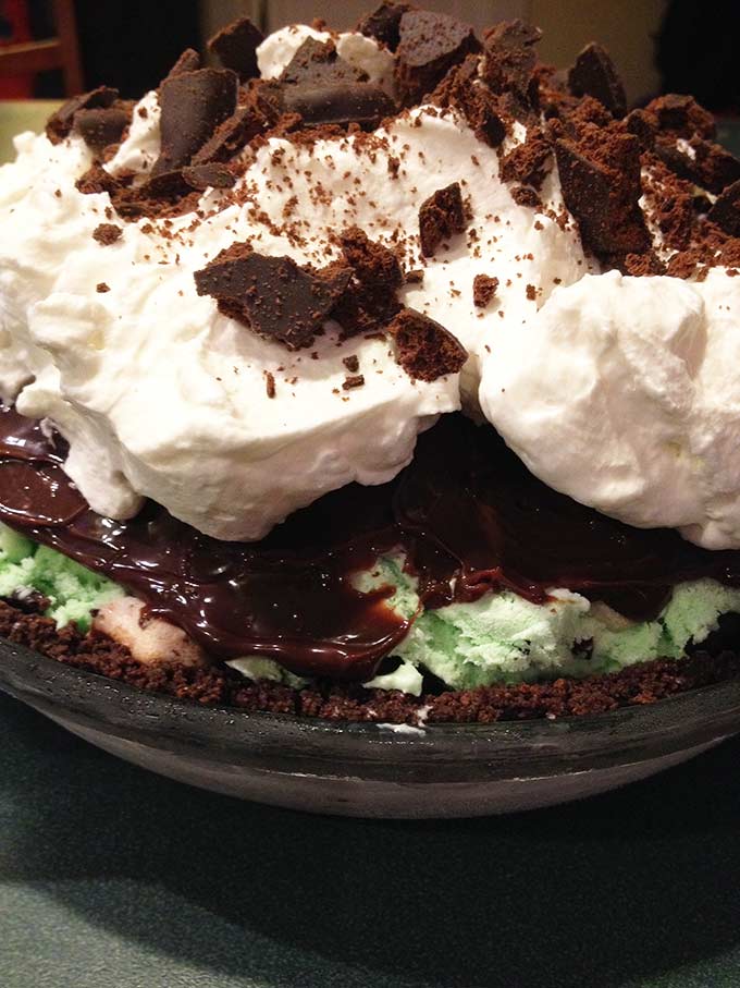 Fudgy Grasshopper Ice Cream Pie: a refreshing summertime treat. If you're into ice-cream pies with ice cream, fudge & cookie layers, this is perfect!