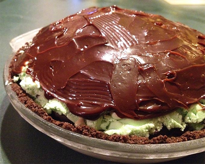 Fudgy Grasshopper Ice Cream Pie: a refreshing summertime treat. If you're into ice-cream pies with ice cream, fudge & cookie layers, this is perfect!