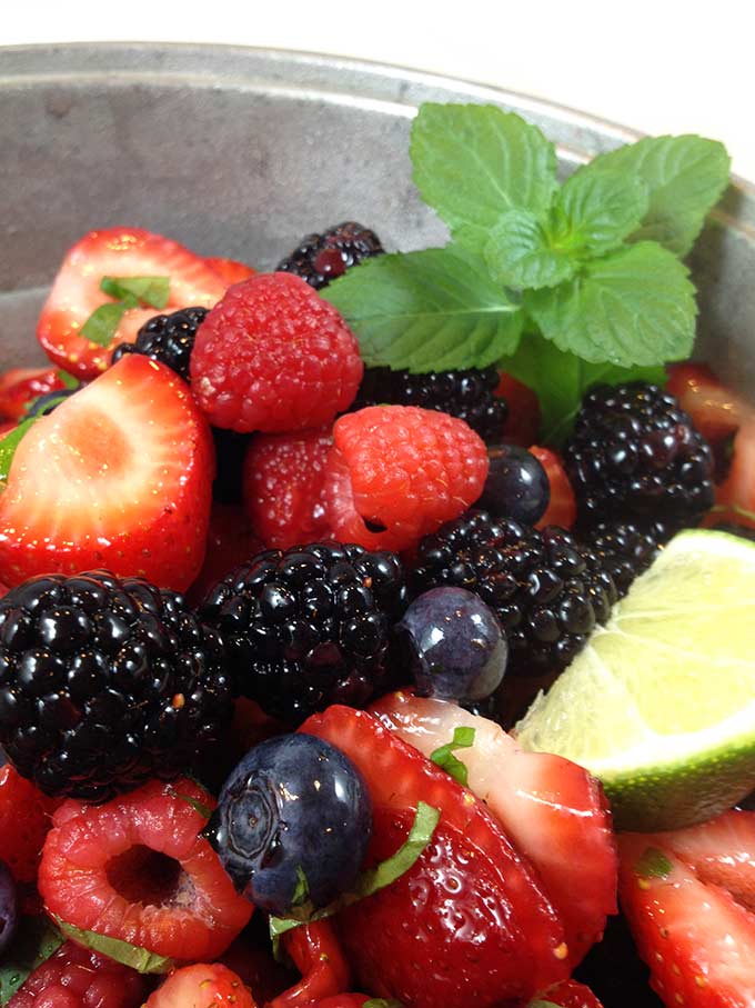Grand Marnier Berry Salad is beautiful, refreshing and light. Perfect for picnics, potlucks and barbecues. Summer berries make a beautiful presentation.