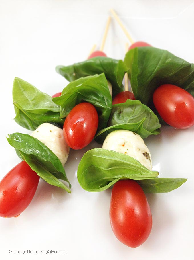 Caprese Mini Kabobs: a quick healthy treat. The easiest most colorful garden fresh appetizer you'll ever make. The perfect accompaniment to grilled burgers.