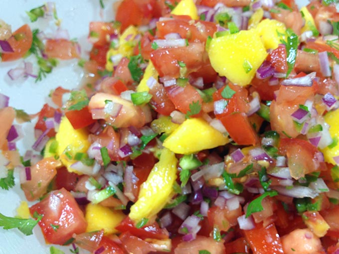 Garden Fresh Mango Salsa. This recipe evolved over the last few years with fresh veggies harvested from our gardens: tomatoes, jalapeño peppers & cilantro.