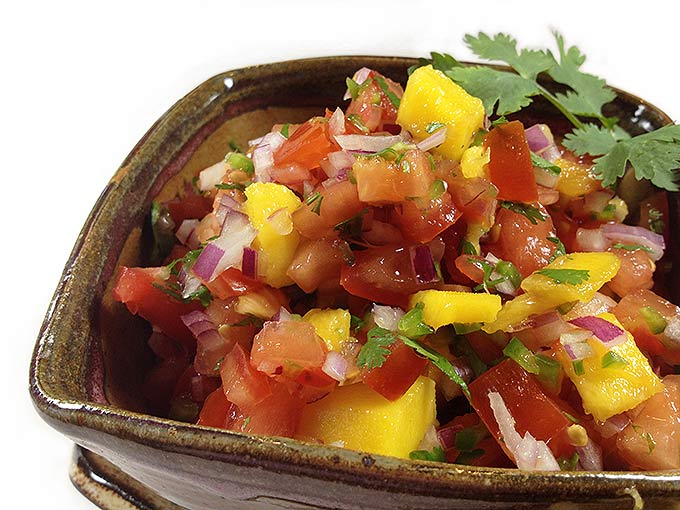 Garden Fresh Mango Salsa. This recipe evolved over the last few years with fresh veggies harvested from our gardens: tomatoes, jalapeño peppers & cilantro.