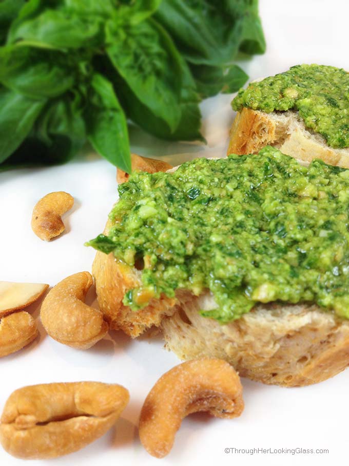 Easy Cashew Basil Pesto. Creamy pesto. Easy to make from my bumper basil crop. Tastes fabulous slathered on crusty bread or tossed with pasta.