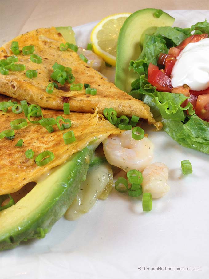 Summery Quesadilla De Marisco. Stuffed with fresh avocado slices, shrimp, melted Havarti dill cheese and green chilies. Light, fresh and delicious!