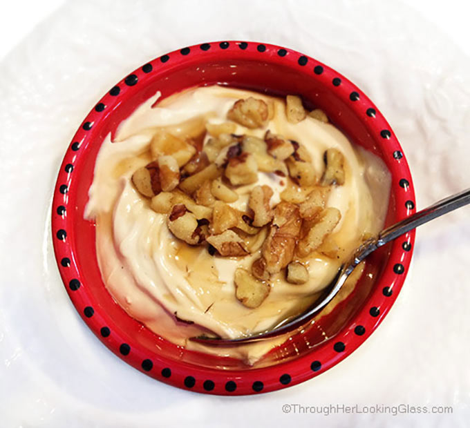 Slow Cooker Maple Vanilla Bean Yogurt. Maple syrup & vanilla bean paste add delicious flavor to thick yogurt. Drizzle w/ maple syrup and top with walnuts.