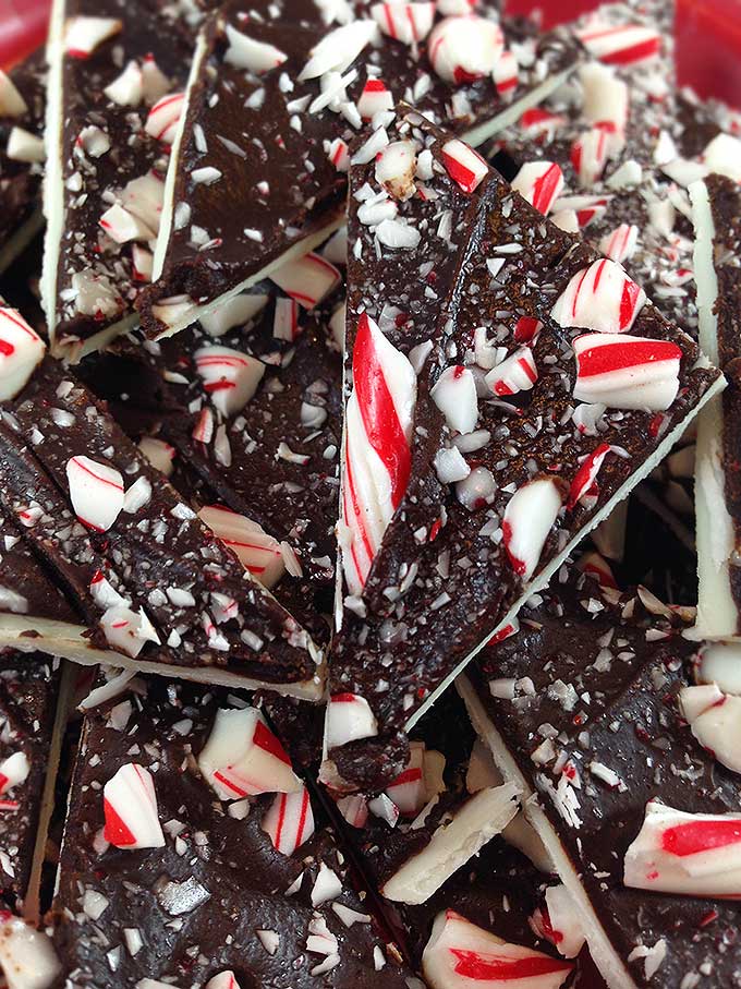 This Peppermint Bark recipe is extra yummy because it has whipping cream mixed in with the chocolate. Goodbye dry peppermint bark. It's also addictive and Santa's favorite.