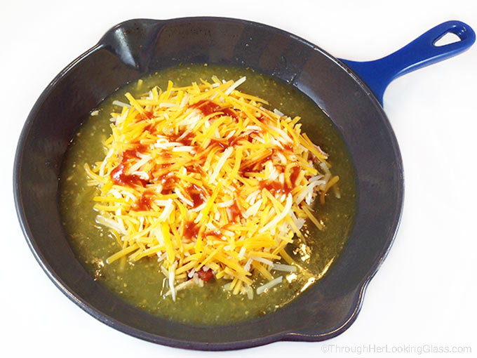 Chipotle Queso Fundido Skillet. Melty, stretchy, molten cheese. Shredded chicken and salsa, tomatillo & chipotle sauces. Smoky, spicy and sweet!