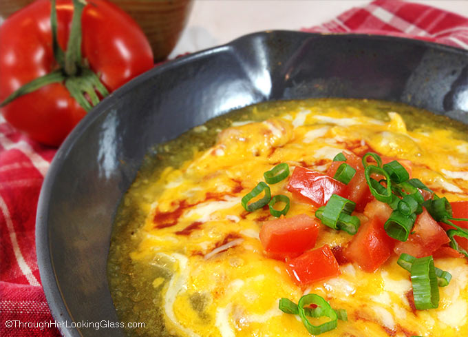 Chipotle Queso Fundido Skillet. Melty, stretchy, molten cheese. Shredded chicken and salsa, tomatillo & chipotle sauces. Smoky, spicy and sweet!