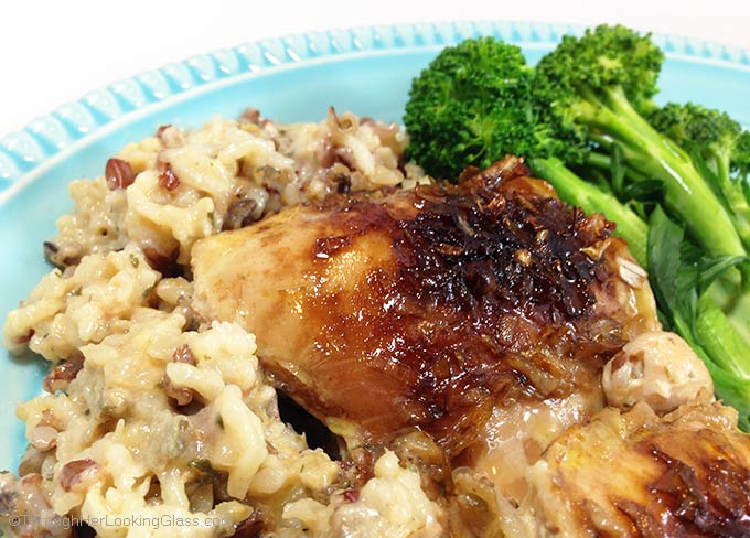 Easy Chicken Thigh & Wild Rice Bake takes 5 minutes to make & bakes unattended for several hours. The chicken & rice are moist and flavorful. Comfort food!