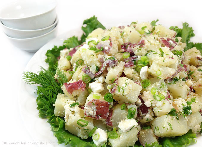 Gourmet Fresh Dill Red Potato Salad with Feta. Olive oil, garlic, fresh dill and feta cheese mingle with tender new potatoes. Always goes FAST!