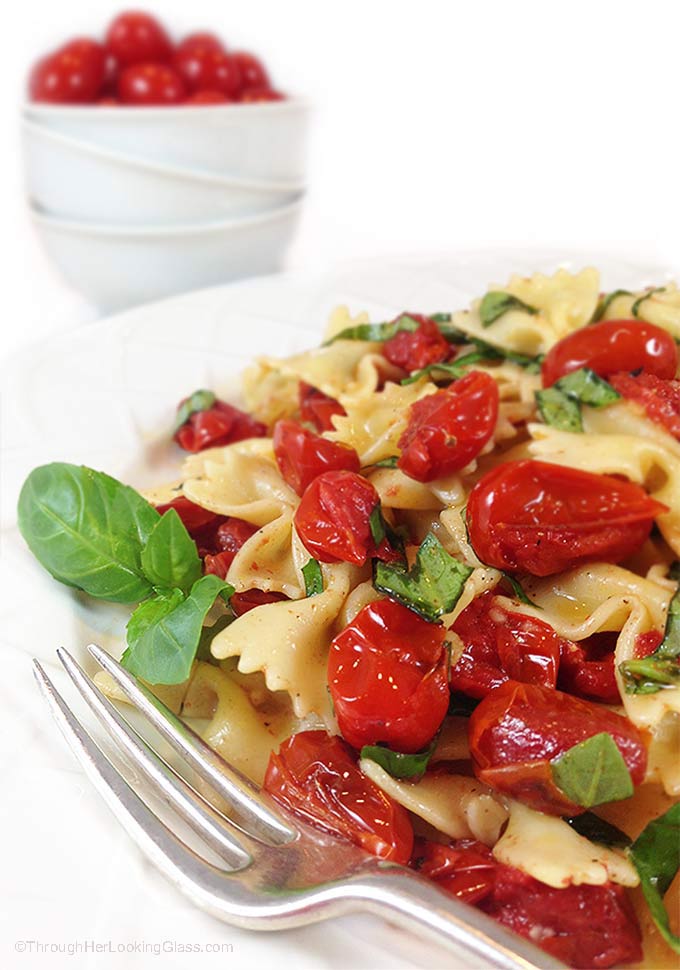 Blistered Tomato Basil Pasta Salad w/Truffle Oil. Ideal summer side dish. Garlic mingles w/basil, blistered tomatoes & farfalle pasta. Irresistible!