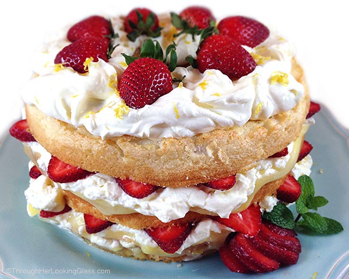 Fresh Strawberry and Lemon Angel Food Cake. Cake layers with fresh strawberries, lemon curd and homemade lemon whipping cream. Stunning and easy dessert!