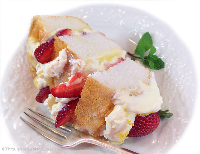 Fresh Strawberry and Lemon Angel Food Cake. Cake layers with fresh strawberries, lemon curd and homemade lemon whipping cream. Stunning and easy dessert!