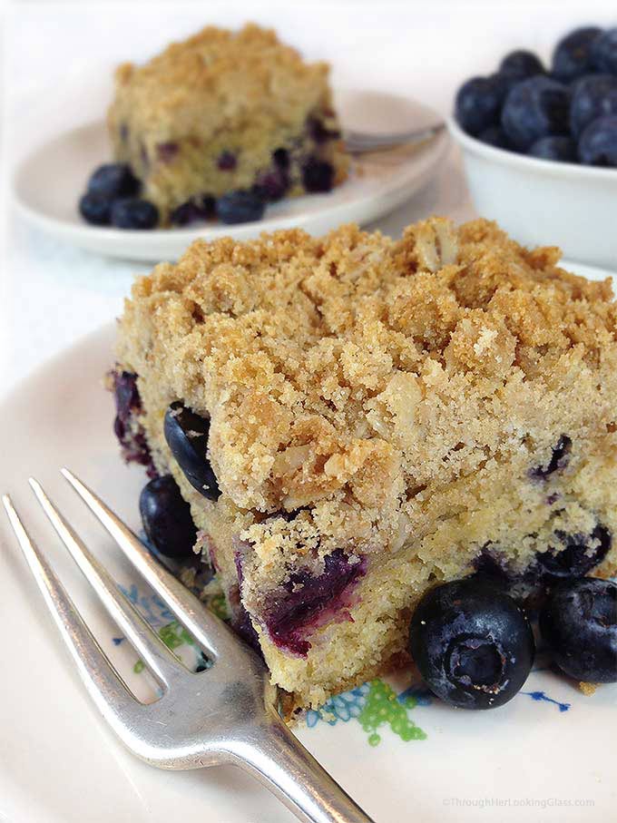 Healthier Oatmeal Streusel Blueberry Breakfast Cake. Tender coffee cake packed w/plump blueberries. White whole wheat flour & coconut oil. A healthier breakfast option.