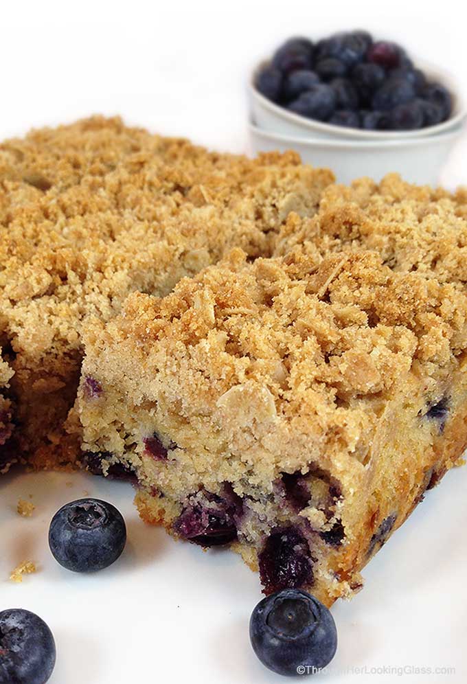 Healthier Oatmeal Streusel Blueberry Breakfast Cake. Tender coffee cake packed w/plump blueberries. White whole wheat flour & coconut oil. A healthier breakfast option.