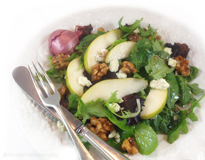 Pear Gorgonzola Salad w/Walnuts & Maple vinaigrette: addictive salad. Sweet maple vinaigrette w/pure maple syrup & shallots complements pears & greens.