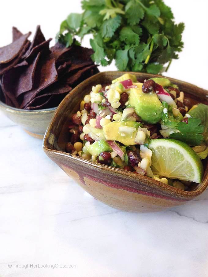 This sweet avocado lime black bean dip disappears faster than I can make it, so I always make a double batch for parties!