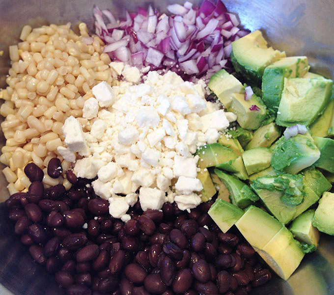 This sweet avocado lime black bean dip disappears faster than I can make it, so I always make a double batch for parties!