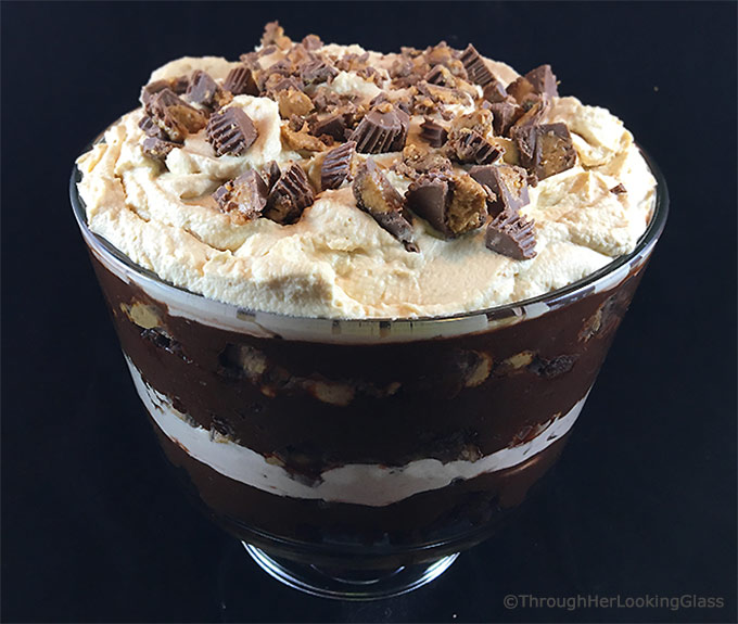 Chocolate Peanut Butter Trifle with Peanut Butter Whipped Cream only looks hard to make! Brownie crumbles, homemade peanut butter whipped cream and creamy chocolate pudding layer with chopped peanut butter cups.