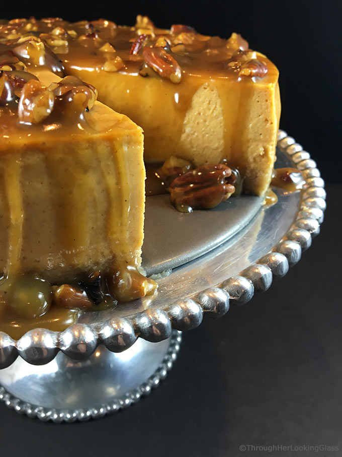 Maple Pumpkin Cheesecake w/Maple Praline Pecan Sauce. Creamy pumpkin cheesecake with a hint of maple smothered in buttery maple praline pecan sauce!
