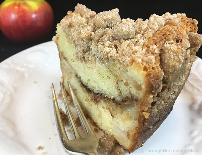 Tender Cinnamon Streusel Apple Coffee Cake: your new favorite sour cream coffee cake. Packed with apples, cinnamon filling & a crumbly cinnamon streusel.