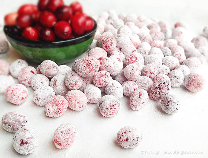 Festive Sugared Cranberries. Bursting w/flavor that pops in your mouth. Sweet & tart. Tangy & addictive. Perfect cheesecake garnish, snack, stocking stuffer or gift. Pretty and delicious on the cheese tray.