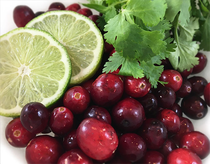 Sweet and tart, tangy and addictive: that's Sweet Lime Cranberry Salsa in a nutshell. So festive and pretty served with fresh cheeses and crackers on the appetizer sideboard.