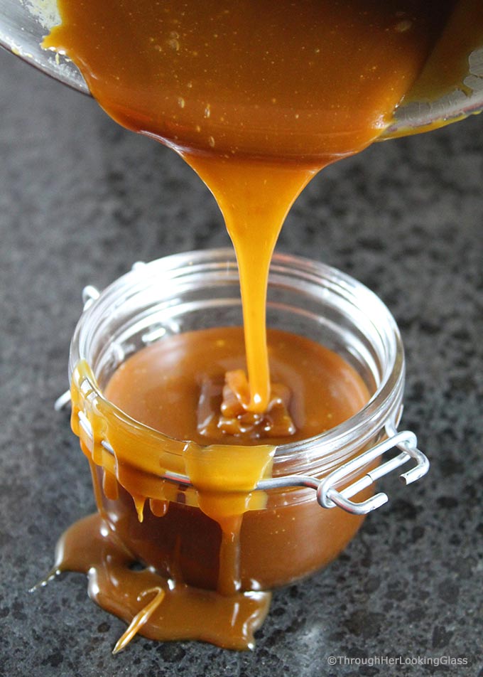 Homemade Salted Caramel Sauce: easy to make & just four ingredients. A drizzle of this velvety smooth salted caramel sauce elevates any dessert to stardom.