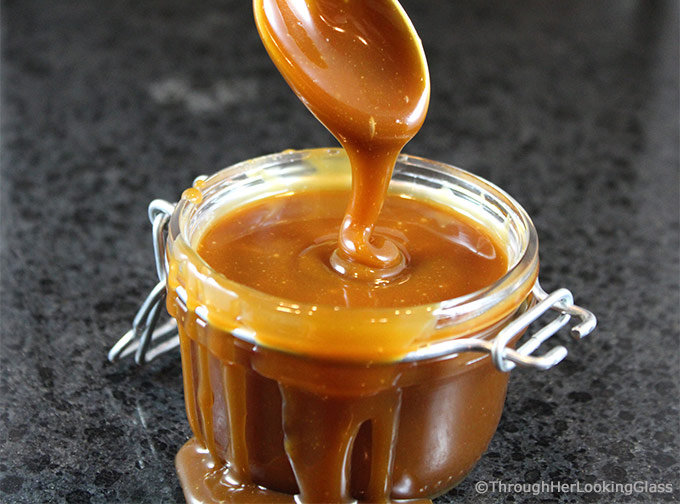 Homemade Salted Caramel Sauce: easy to make & just four ingredients. A drizzle of this velvety smooth salted caramel sauce elevates any dessert to stardom.