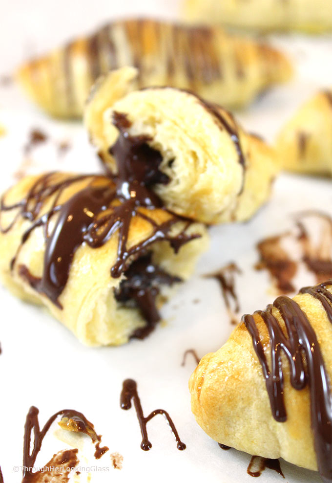 Pain Au Chocolat (Chocolate Croissant Recipe): Light, flaky, chocolate-filled buttery croissants with chocolate drizzle. Impressive bakery-style pastries.