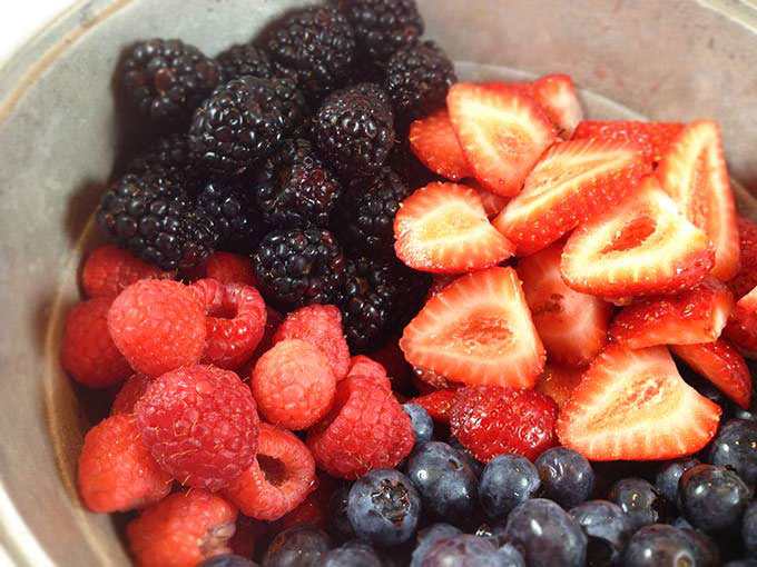 Grand Marnier Berry Salad is beautiful, refreshing and light. Perfect for picnics, potlucks and barbecues. Summer berries make a beautiful presentation.