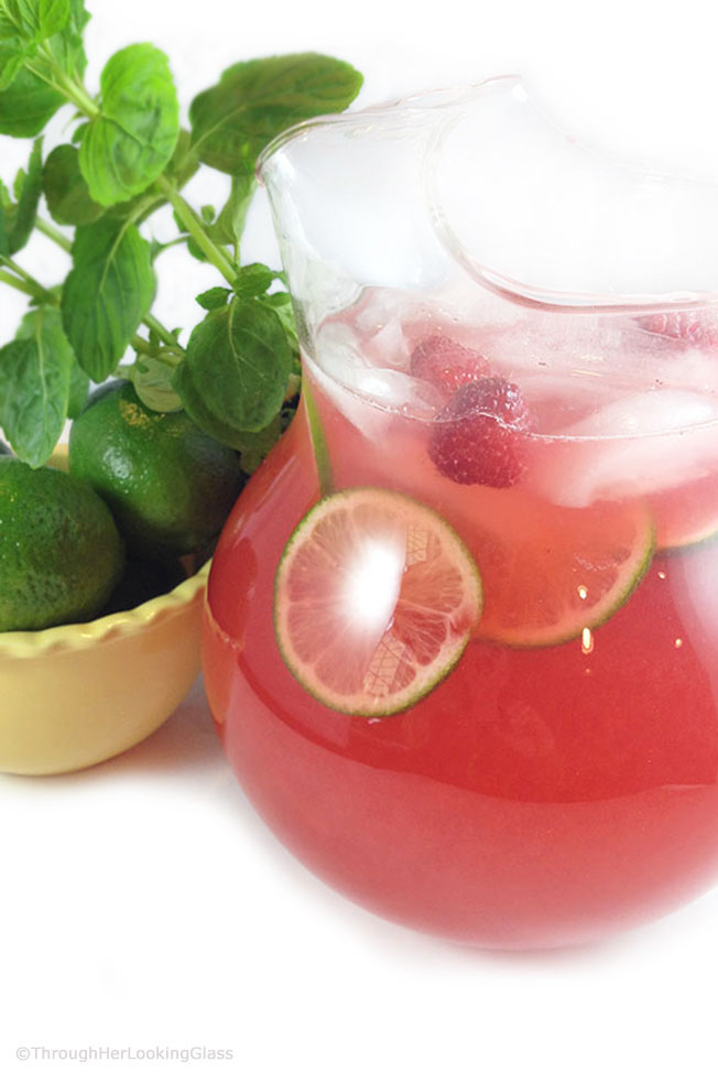 Raspberry Limeade: the perfect fun, summery drink. Cool and refreshing. Sweet and tart. And pink! Says summer and vacation in a fabulously fruity way.