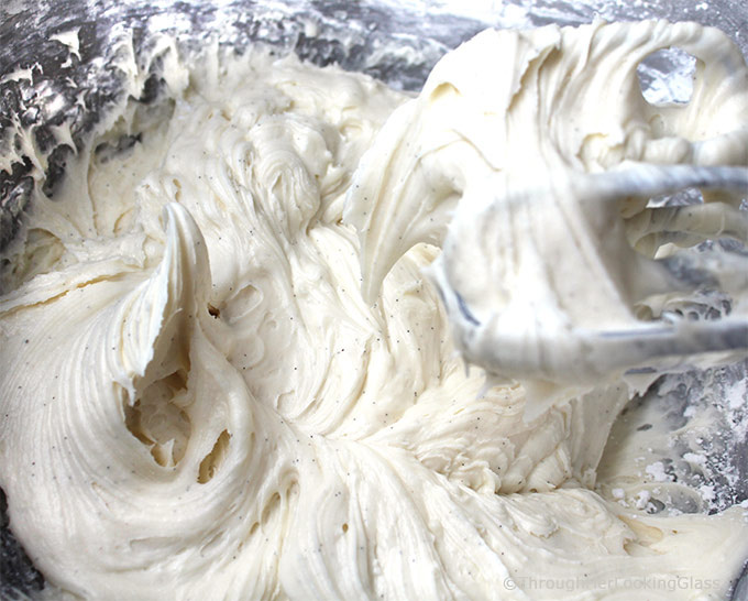 Vanilla Bean Cream Cheese Frosting Recipe: Light, fluffy frosting flecked with yummy vanilla bean specks. Perfect frosting for cakes and cupcakes alike!