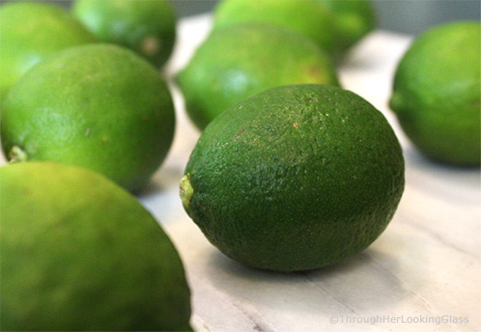 several whole limes used to make this easy limeade recipe